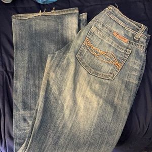 Women’s Cowgirl Tuff jeans. Lighter wash. Size 27. Length 33. Bootcut.